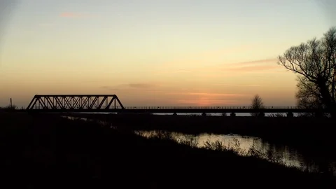 A Class 156 diesel Multiple Unit at Sunset Video stock 122738631