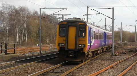 Class 156 dmu passenger train approaching Wigan North Western railway station Stock Footage 41638851