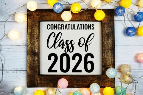 Class of 2026 text with Colorful LED cotton ball decorative on wooden backg.. Stock Photos