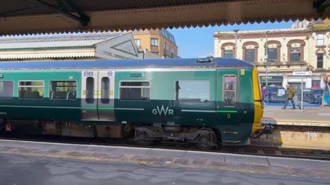 Class 58 diesel commuter train of Great Western Railway train leaving Paignton Stock Footage 308409203