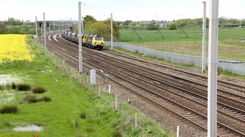 Class 70 diesel engine hauling Freightliner coat hopper wagons in Lancashire Stock Footage 41639667