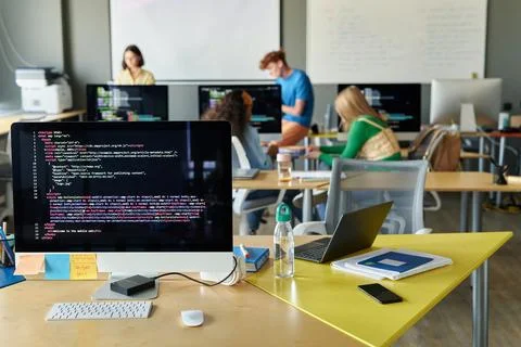 Class with Computer on Desk in IT Class Stock Photos