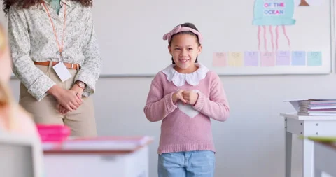 Class, presentation and nervous child speaker with learning and shy in classroom Stock Footage 249388933