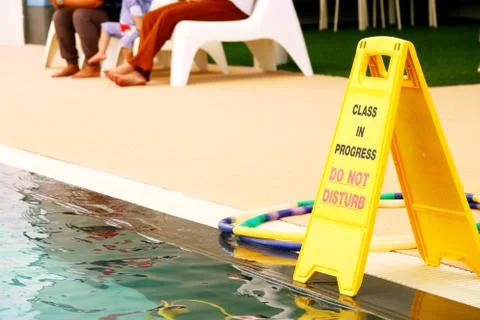 Class in progress do not disturb Sign at swimming pool Stock Photos