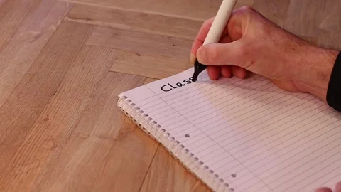 Class written as a heading by adult learner in mature education progr Stock Footage 257803702