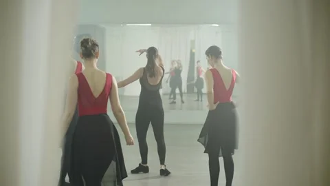Classes in the studio with the trainer of the ballet group. Stock Footage 240940754