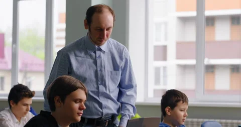 Classes Of Web-Design And Programming In School, Teacher And Pupils In Computer Stock Footage 280175760
