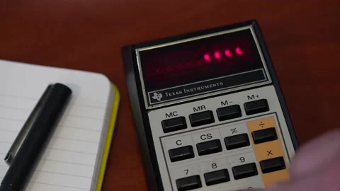 A classic 1970s HP calculator doing simple computations Stock Footage 160376812