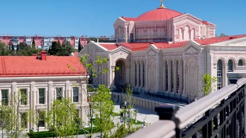 Classic architecture with a vibrant red roofline Stock Footage 335315789