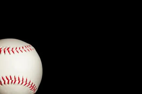 Classic Baseball on a Black Background with Copy Space Stock Photos