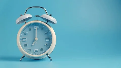 Classic bell alarm clock ring at 7am Stock Footage 123811917