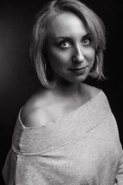 Classic black-and-white dramatic portrait of blonde woman in Studio on black  Stock Photos