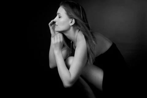 Classic black-and-white dramatic portrait of an adult blonde woman in Studio  Stock Photos