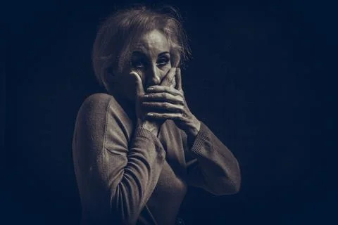 Classic black-and-white dramatic portrait of elderly blonde woman in Studio o Stock Photos