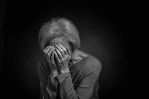 Classic black-and-white dramatic portrait of elderly blonde woman in Studio o Stock Photos