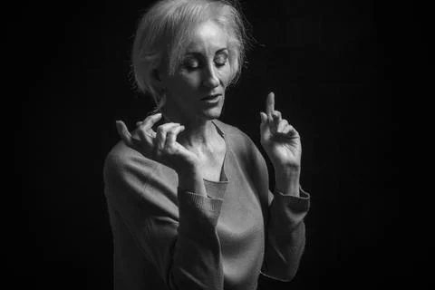 Classic black-and-white dramatic portrait of elderly blonde woman in Studio o Stock Photos