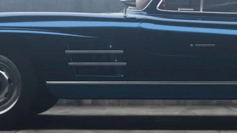 Classic blue car shines in dramatic lighting revealing vintage design elements Stock Footage 321957949