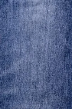 Classic blue denim background. Stock Photos