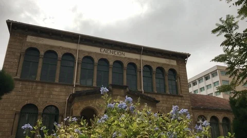 Classic Building behind Flower Видео 100619970