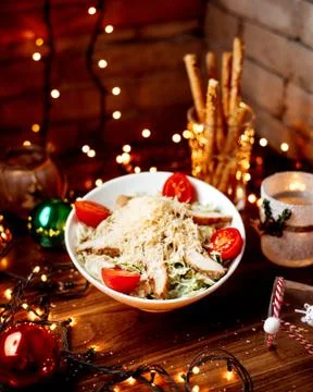 Classic caesar with chicken and grated parmesan Stock Photos