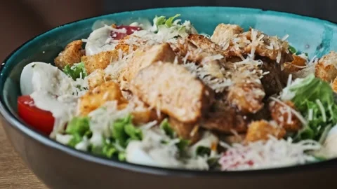 Classic Caesar Salad with Grilled Chicken Video stock 293553912