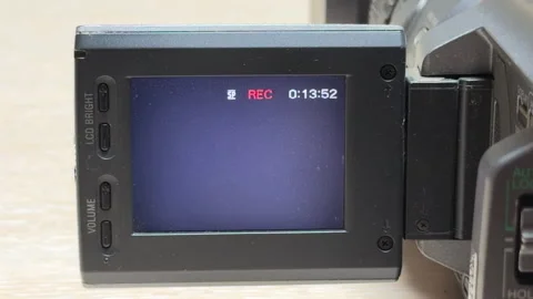 Classic Camcorder Eagerly Starts Recording With a Sharp Electronic Beep Stock Footage 329087350