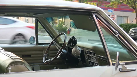 Classic car dashboard and steering wheel, Classic car street festival Stock Footage 138190281