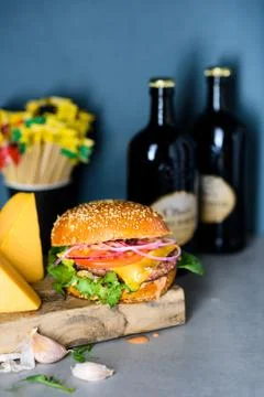 Classic cheeseburger with beef cutlet. Close up, Fast food. Stock Photos