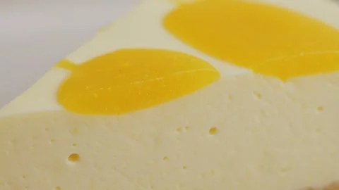 Classic cheesecake with jam topping close-up view. Dessert concept. Stock Footage 306160923