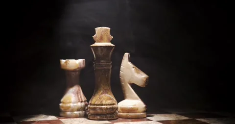 Classic Chess Pieces With Dramatic Lighting Create a Timeless Atmosphere Stock Footage 338141471
