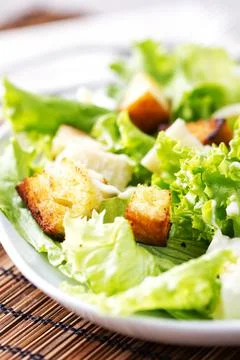 Classic Chicken Caesar Salad on a plate. Stock Photos