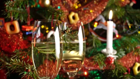 Classic Christmas Tree with Champagne and Candle Light at Christmas Eve Stock Footage 123719857