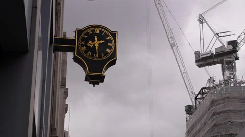 Classic Clock with Construction Crane in Central London Stock Footage 337124584