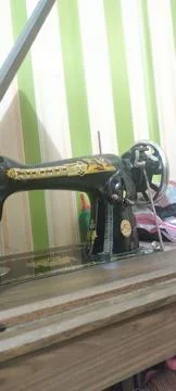 Classic clothes sewing machine Stock Photos