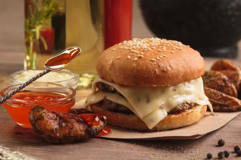 Classic double cheeseburger with ingredients 스톡 사진