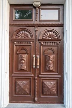 Classic double door with brown patterns. Stock Photos