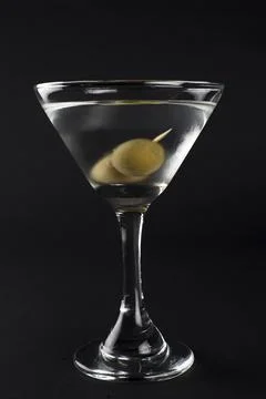 Classic dry martini with olive Stock Photos