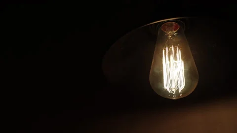Classic Edison Light Bulb Close-up. Edison Light Bulb On The Dark Background. 60 스톡 동영상 207077591
