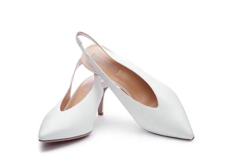 Classic elegant white open-back high-heels isolated on the white background.. Stock Photos