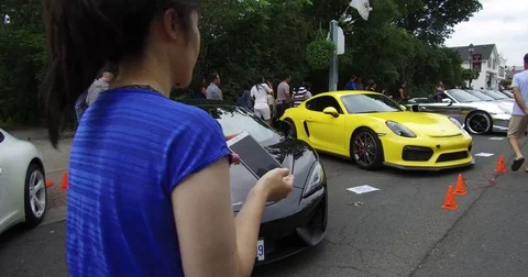 Classic exotic expensive car show in the summer on main street Markham Canada Stock Footage