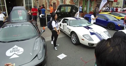 Classic exotic expensive car show in the summer on main street Markham Canada Stock Footage