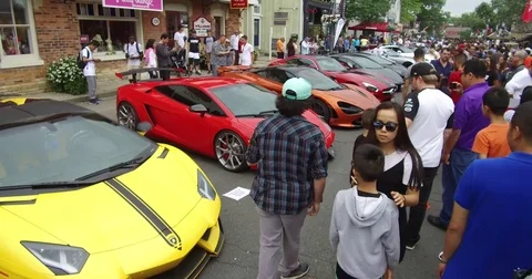 Classic exotic expensive car show in the summer on main street Markham Canada Stock Footage