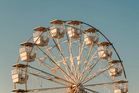 Classic Ferris wheel viewed from below, highlighting its geometric metal st.. Stock Photos