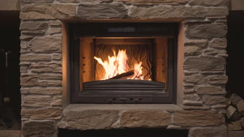 Classic fireplace with a burning fire Stock Footage 151785445