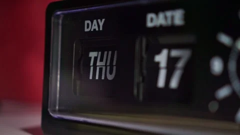 Classic flip clock face. Change date and day date panels and analog hands Stock Footage 345293533