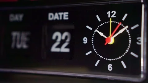 Classic flip clock with ticking hands, dark moody background, retro timepiece Stock Footage 342637112