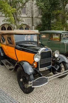 Classic Ford Model A in Phaeton version on cobblestone road Stock Photos