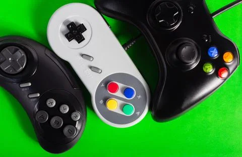 Classic game pads and controllers. Stock Photos
