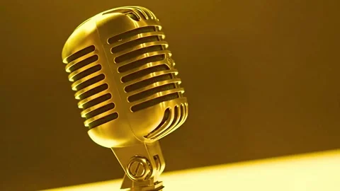 Classic gold microphone on clean yellow background for professional audio Stock-Footage 341801921