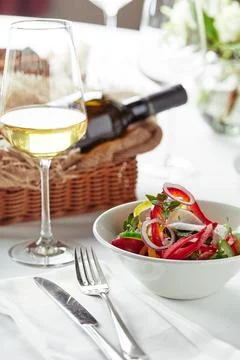 Classic Greek salad. Banquet festive dishes. Gourmet restaurant menu. White Stock Photos